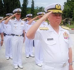 After laying a wreath to pay respect to Thai marines who died during service, Adm. Masahiko Sugimoto salutes active-duty personnel for their support after the March 11 earthquake.